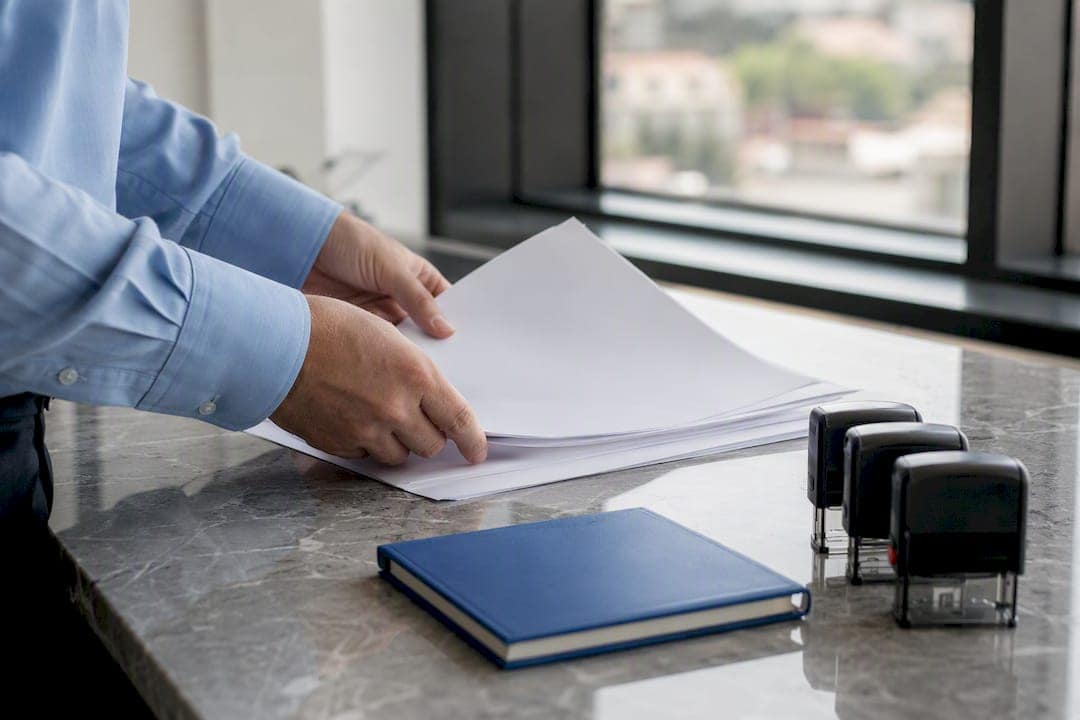 Hand arranging training and payroll export documents